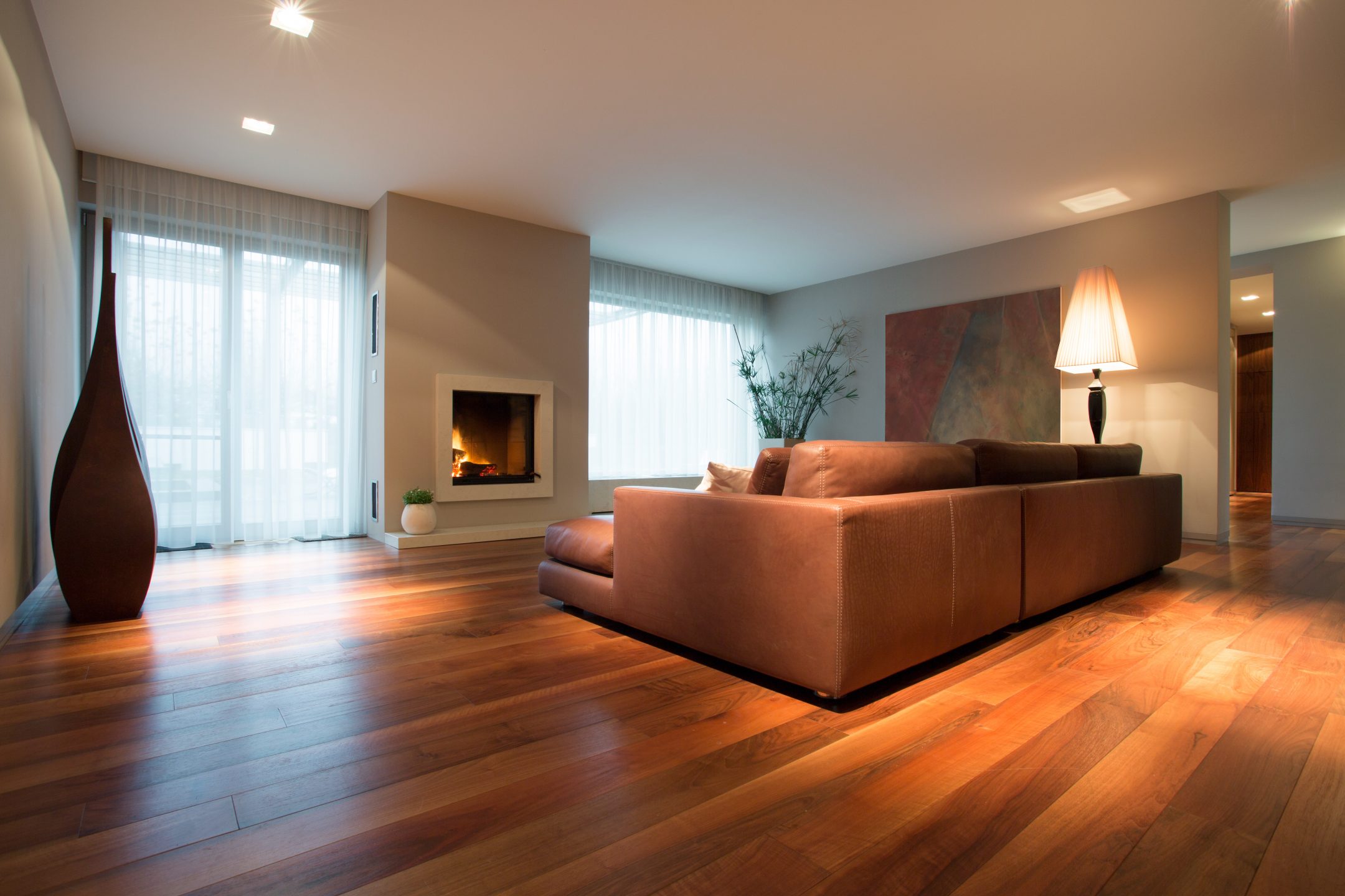 A living room with natural wood floor